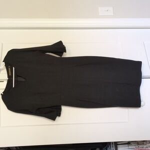 Black dress. Tight fitting. Size medium Woosunze brand